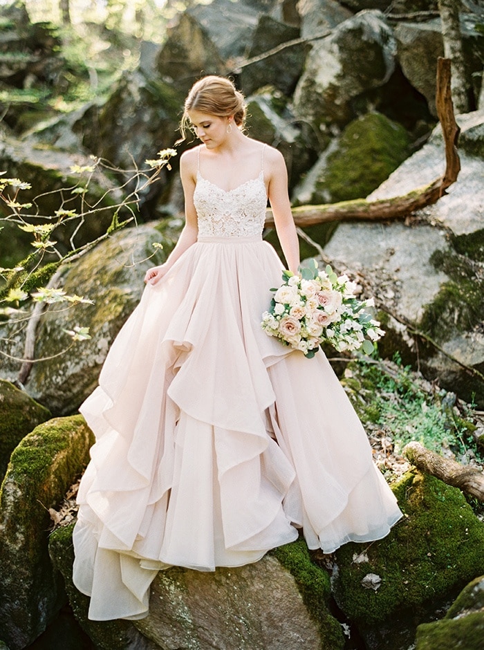 An enchanted forest bridal shoot in a pink marble quarry turned wedding ven...