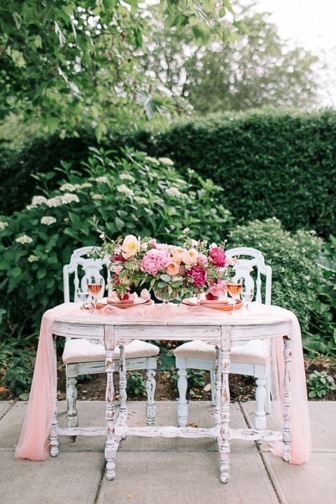 Antique White Sweetheart Table with a Peach Runner