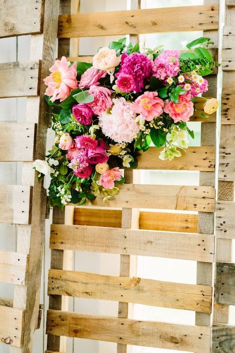 Pallet Wall with Colorful Summer Flowers for a Modern Rustic Wedding Backdrop