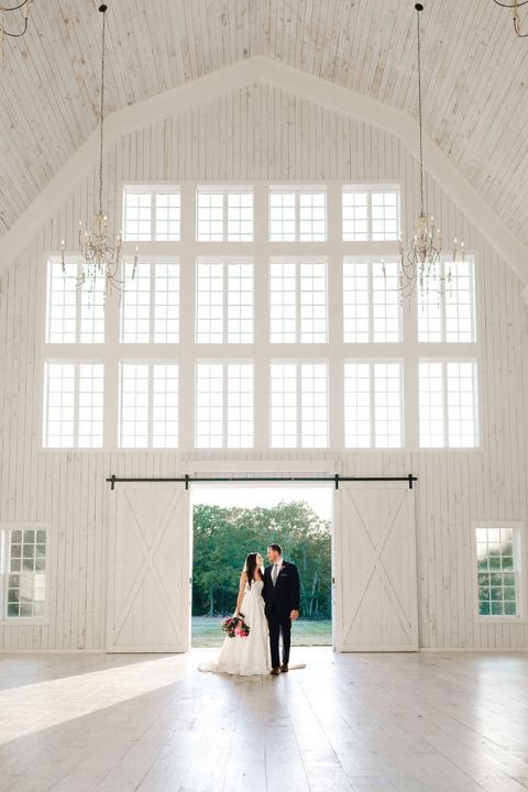 Bride and Groom Entering Their Barn Wedding Reception