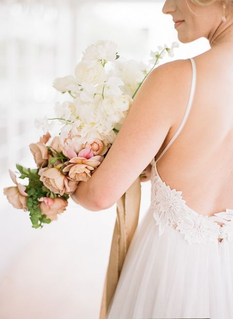 Open Back Lace Wedding Dress with a Lush Peach and Cream Bouquet