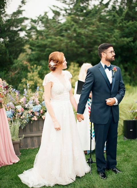 Bride and Groom Listening to a Ceremony Reading