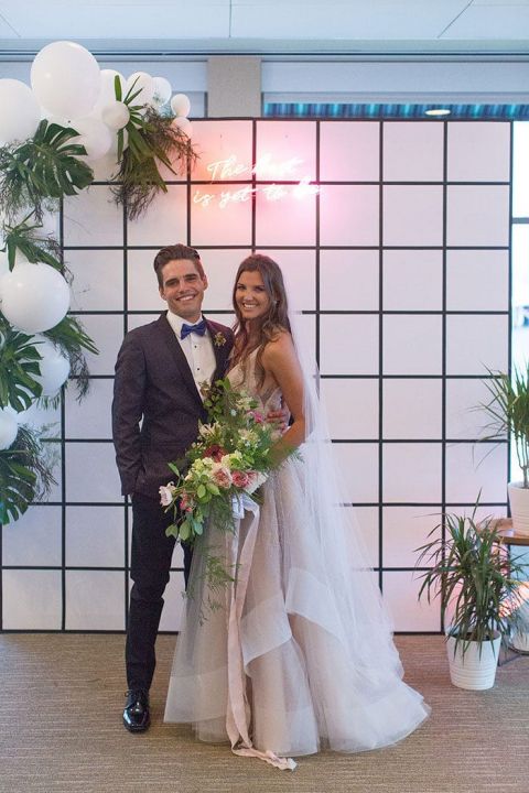 Modern Geometric Ceremony Backdrop with a Neon Sign