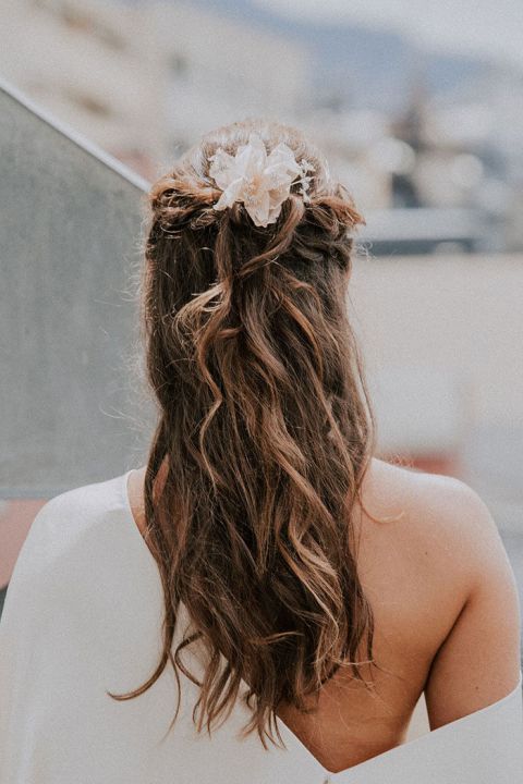 Romantic Half Up Bridal Hairstyle with a Flower