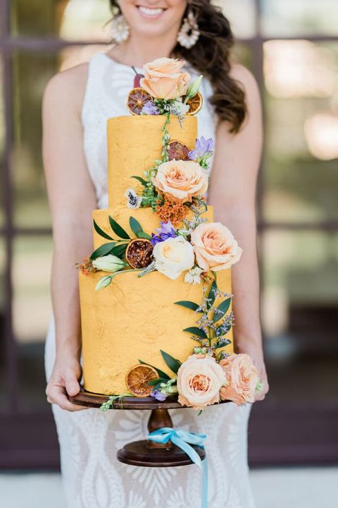 The Most Gorgeous Colorful Cake in Marigold Yellow with Fresh Flowers and Dried Fruit