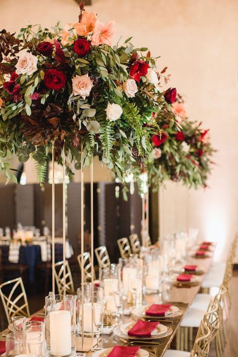 Decor of a Wedding Restaurant in Maroon Color with Flowers Stock