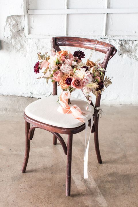 Industrial Farmhouse Wedding Inspiration with Rustic Fall Flowers for the Bride's Bouquet