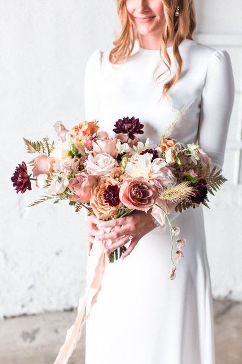 Industrial Farmhouse Wedding Inspiration with Rustic Fall Flowers for the Bride's Bouquet