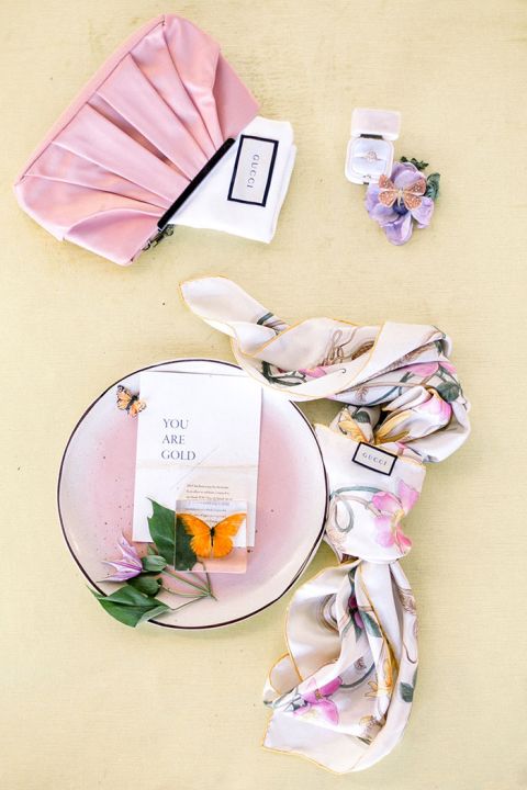 Rainbow Pastel Accessory Flatlay with Butterfly Details