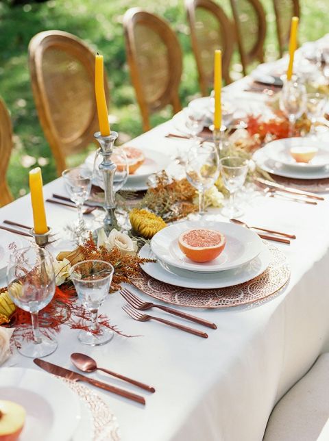 Fall Celebration Tablescape with Orange and Yellow Decor and a Dried Flower Runner for a Locally Sourced Wedding