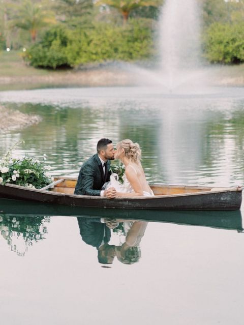 Romantic Canoe Wedding Photos with Flowers and Greenery