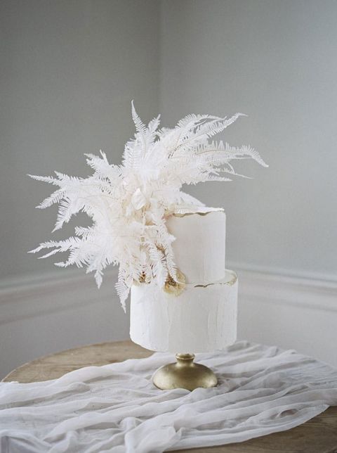 White and Gold Wedding Cake with a Bleached Fern Cake Topper