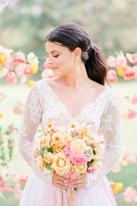 Cool Bride Look with Lace Body Suit with a Watercolor Skirt and Modern Gold Earrings