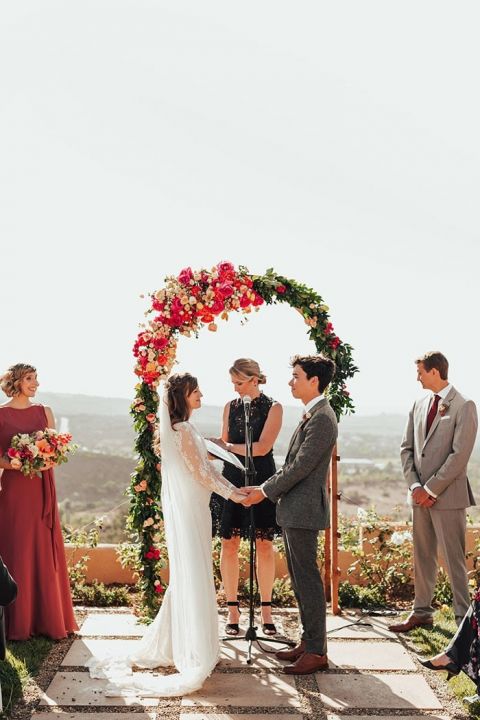 Colorful Fall Flowers for a Ceremony Arch at a Backyard Wedding in San Diego