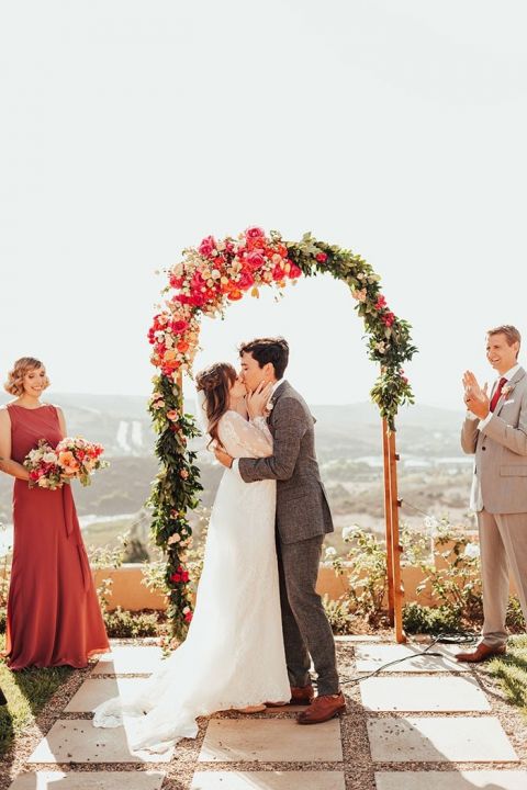 Colorful Fall Flowers for a Ceremony Arch at a Backyard Wedding in San Diego