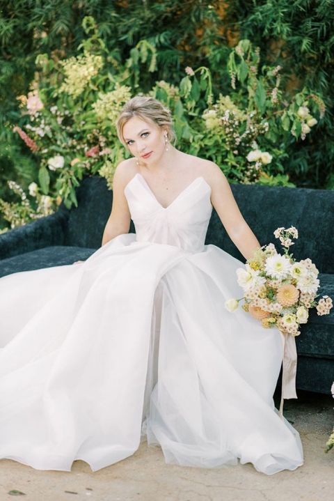 Structured Beccar Couture Wedding Dress on a Black Velvet Lounge