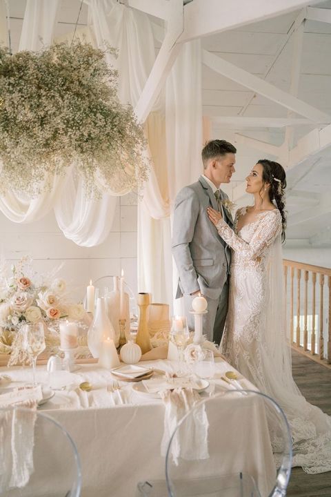 Airy Modern Bohemian Style for a Farmhouse Wedding with Drapery and Hanging Dried Flowers