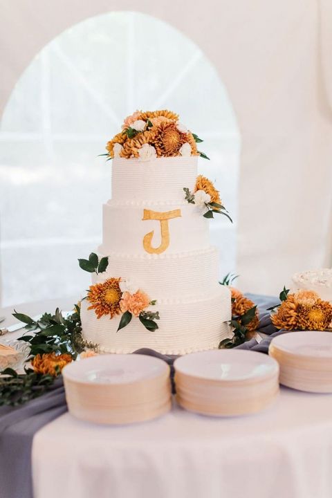 Fall Flowers for a White Monogram Wedding Cake