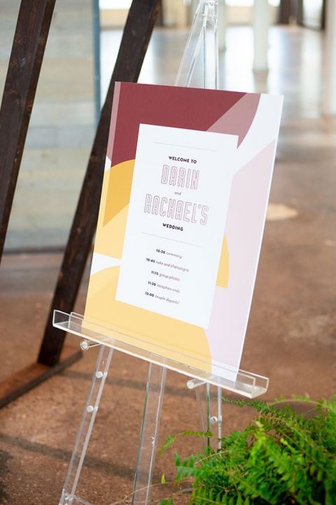 Colorful Retro Wedding sign on a Clear Acrylic Easel