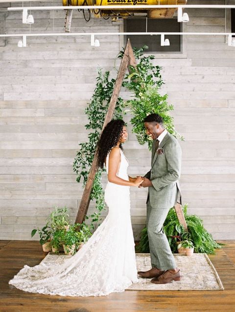 Rustic Wood A-Frame Wedding Ceremony Backdrop with Modern Greenery Decor