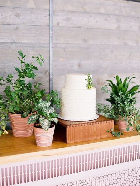 Farmer's Market Wedding Cake Display with Modern Greenery Decor
