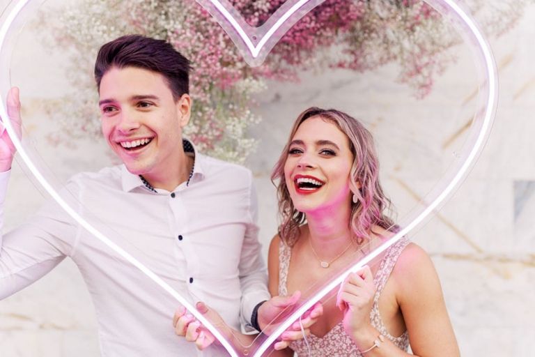 Valentine's Day Engagement Couple's Shoot with a Pink Neon Heart 