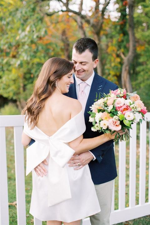 Bow Back Little White Dress with an Off the Shoulder Neckline for a Preppy Relaxed Backyard Ceremony