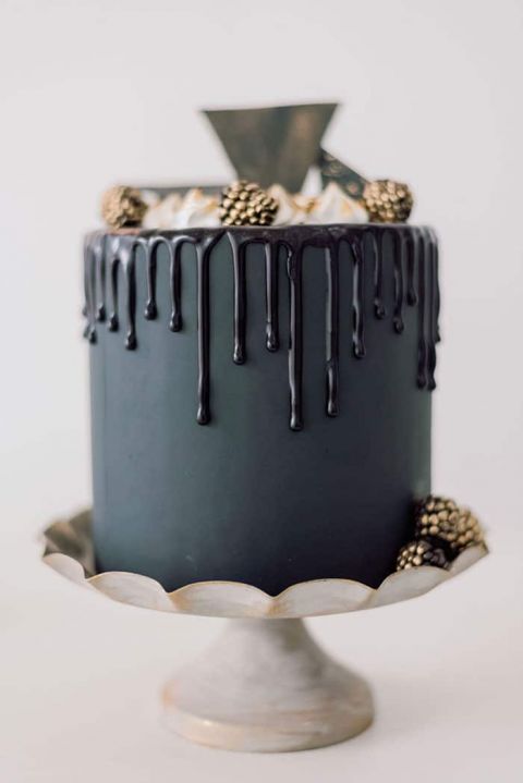 A Black Wedding Cake with Light and Airy Minimalist Decor for Early Spring  - Hey Wedding Lady