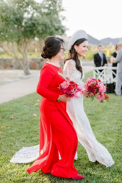 Vietnamese Bride in a Custom Ao Dai walked down the Aisle by her Mother