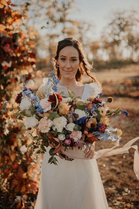 If Fresh Flowers aren't Your Thing, This Foraged Fall Wedding Arch is Ceremony Goals