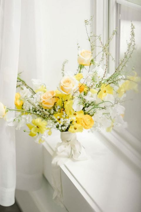 yellow flower wedding arrangements