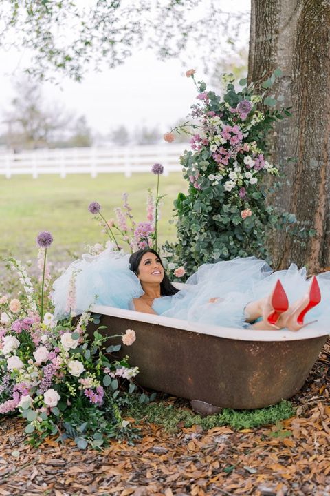 Red Heel Shoes Bridal Picture in a Vintage Bathtub for a Pastel Valentine's Shoot